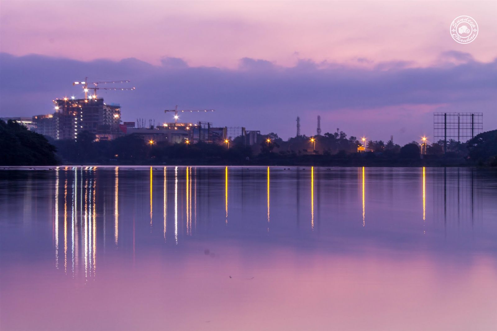 Pre-dawn purple reflections at Hebbal Lake, Bangalore