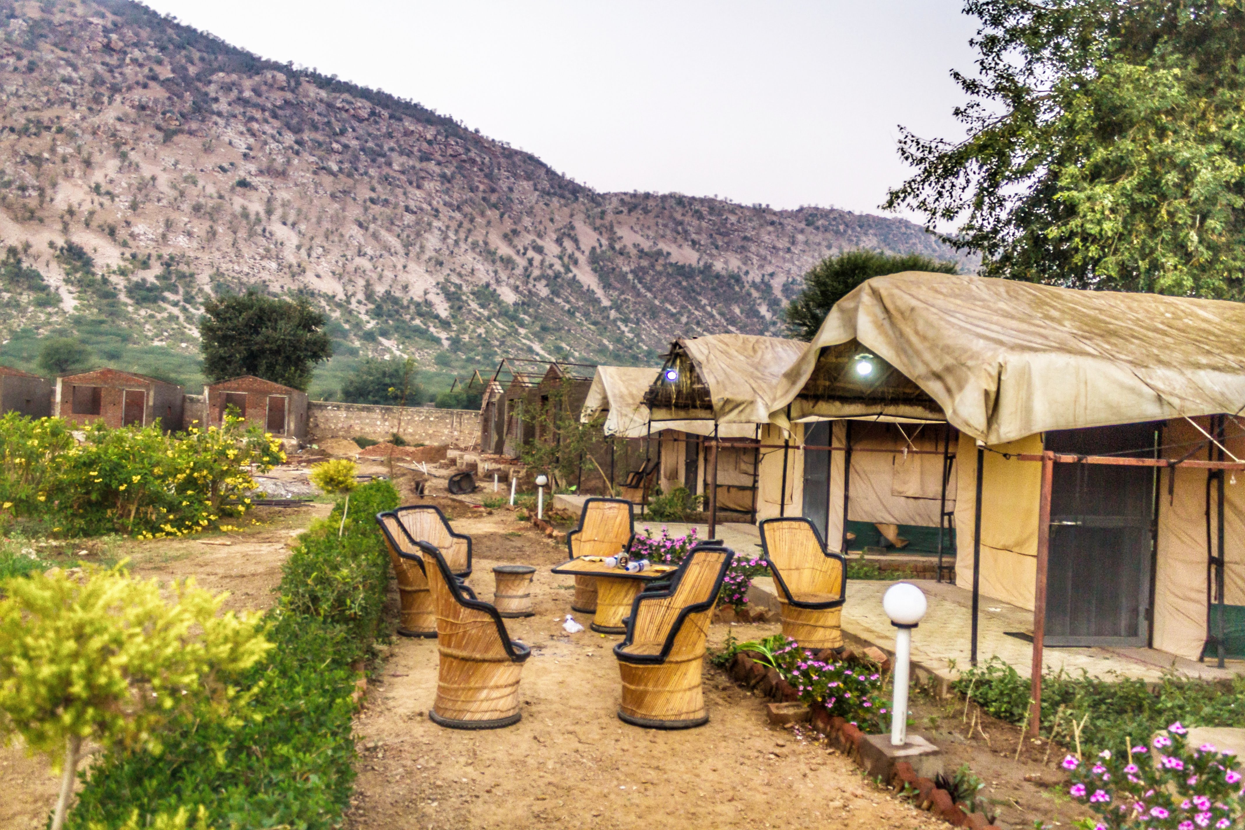 Aravalli Camp tents and cane chairs by Sundeep Chauhan