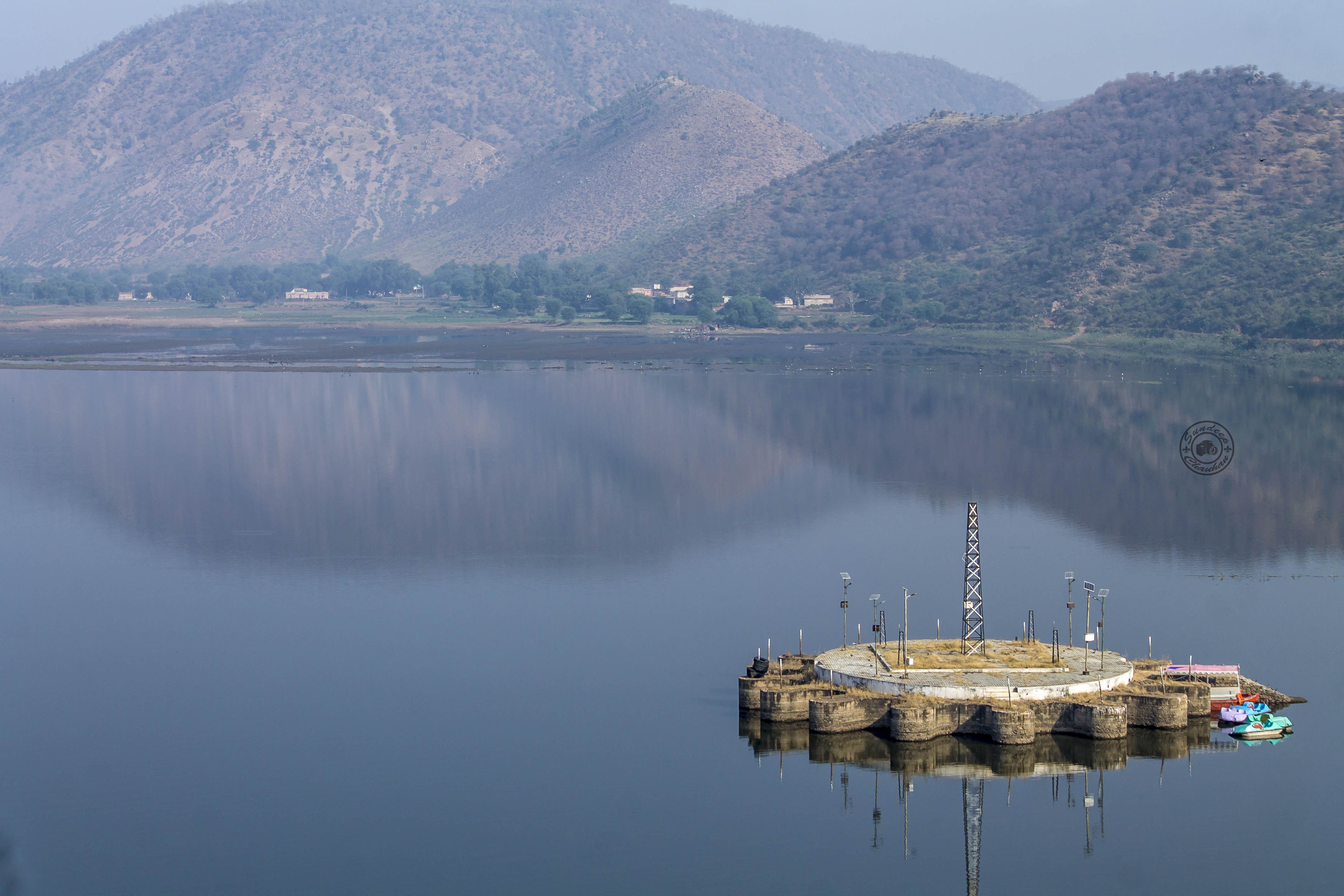 Siliserh Lake reflection and water platform by Sundeep Chauhan